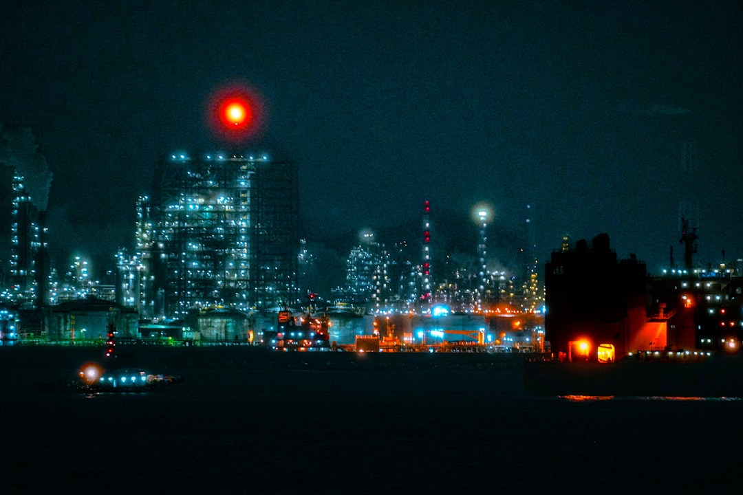 industrial-cityscape-with-glowing-lights-at-night-xwdvgw-x0k4